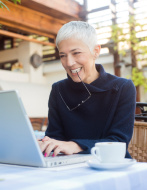 stock-photo-29199034-mature-woman-working-at-caffe